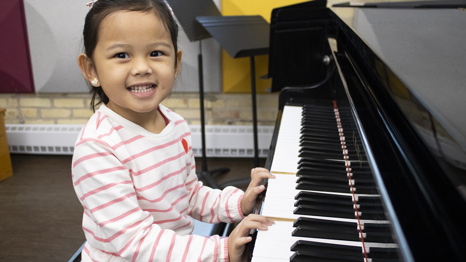 Manitoba Conservatory of Music & Arts student playing piano