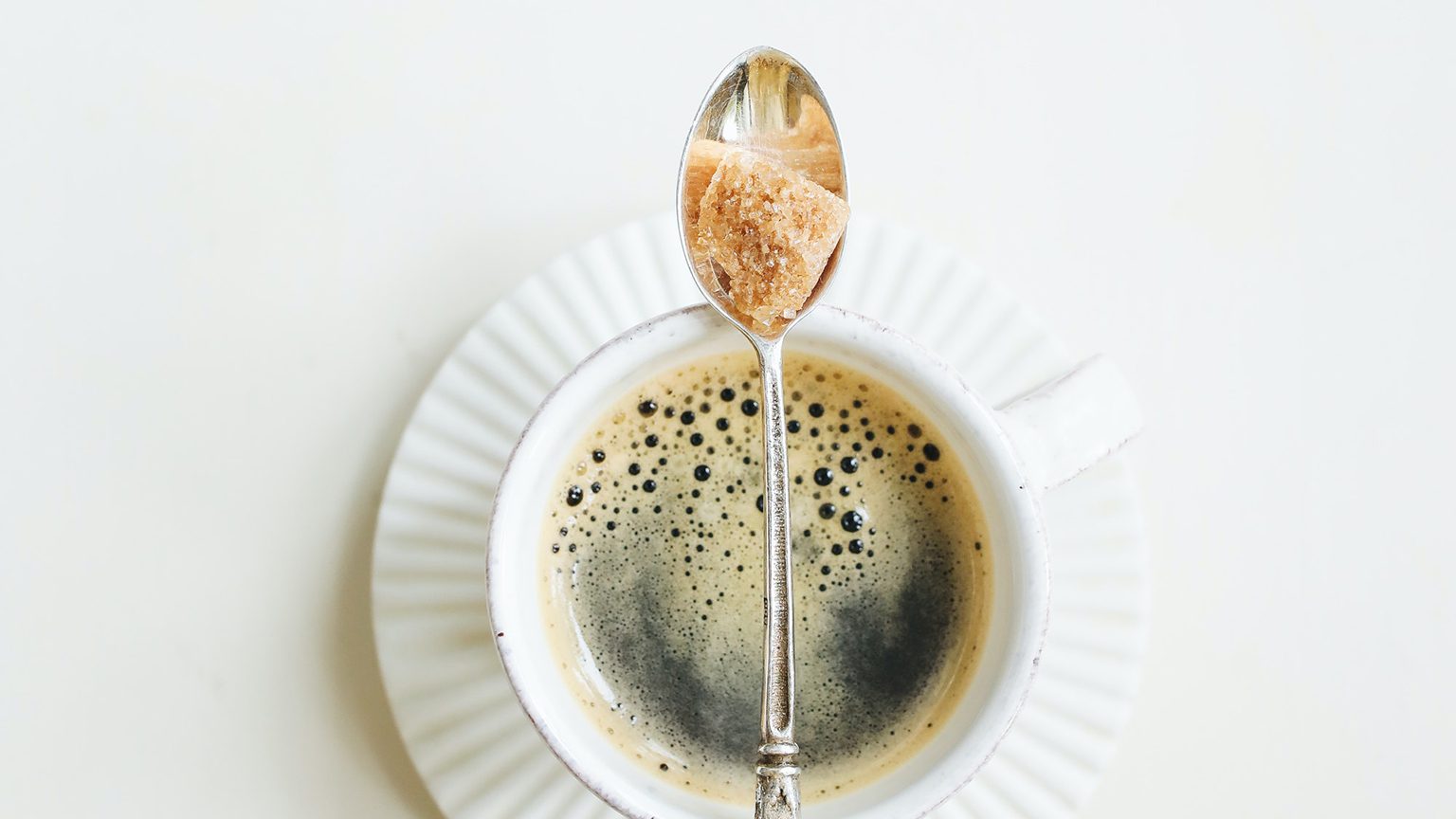 Coffee cup with a spoon