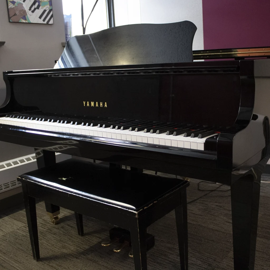 Piano in a practice room