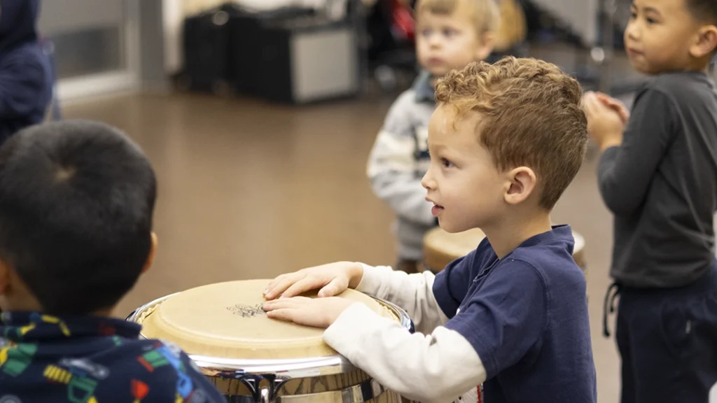 Adventures in Music students drumming