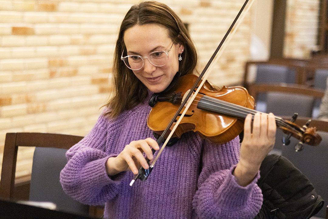 Student playing the fiddle