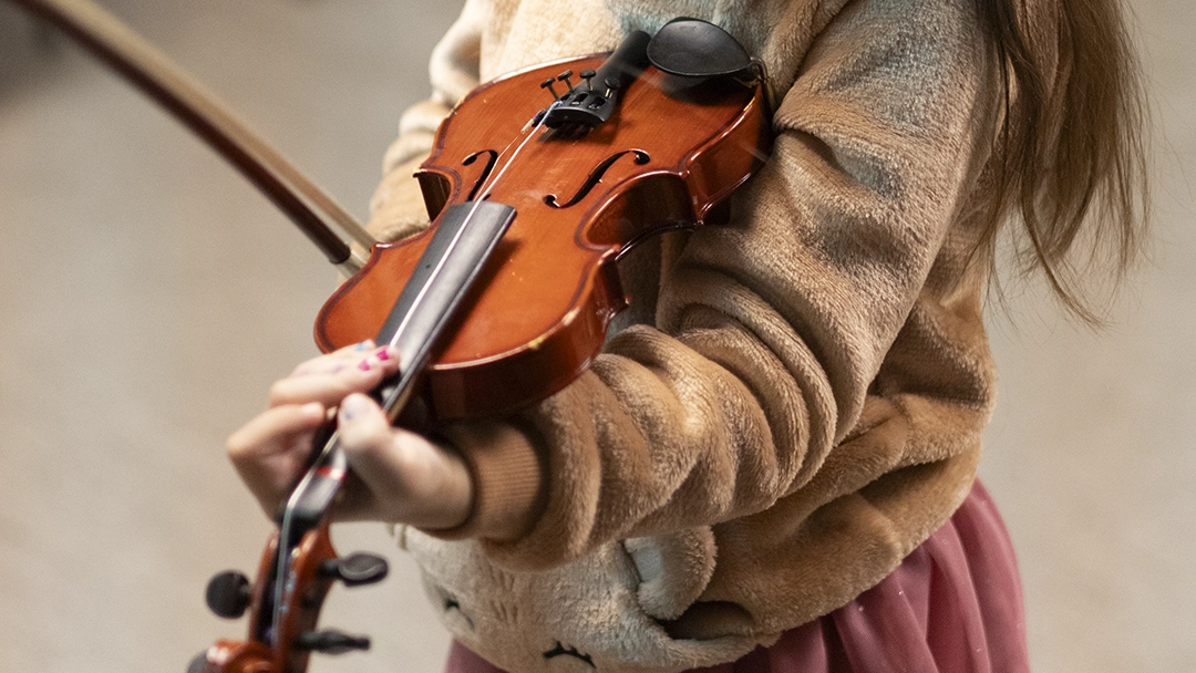 Child playing violin