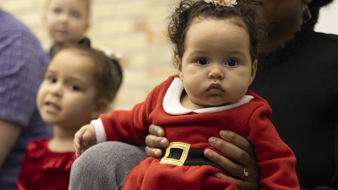 IMG_7608_website baby wearing a Santa suit