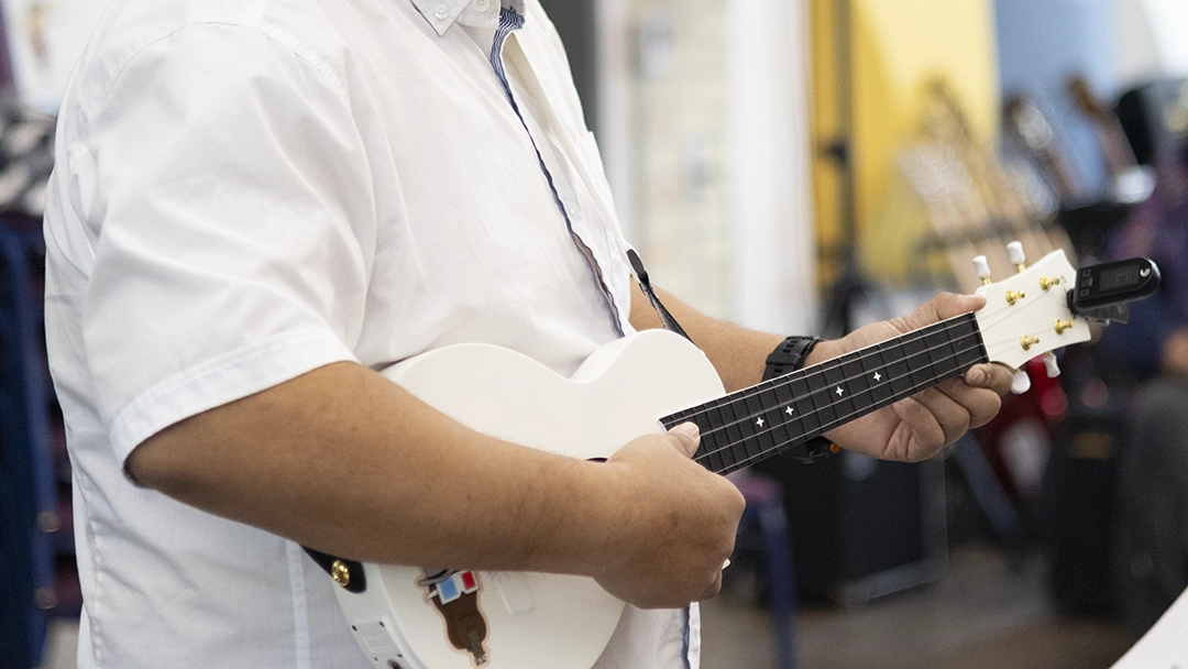 IMG_0944_website Phil Natividad holding an ukulele