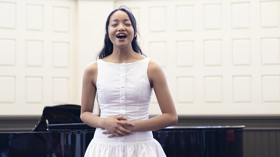 Student singing at Adult Student Year-End recital